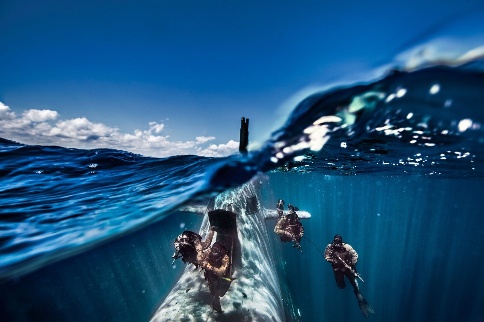 190117-comsubin-exiting-a-submarine