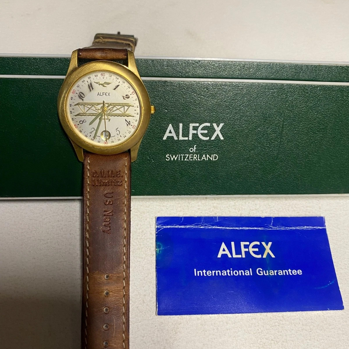 Alfex quartz watch from the 1980s with a leather strap featuring an almost identical embossing